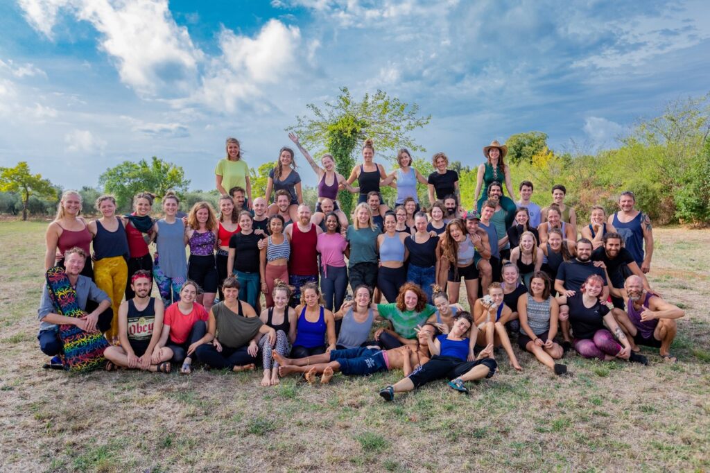 Big group picture during a sunny day on our AcroYoga retreat in Croatia.